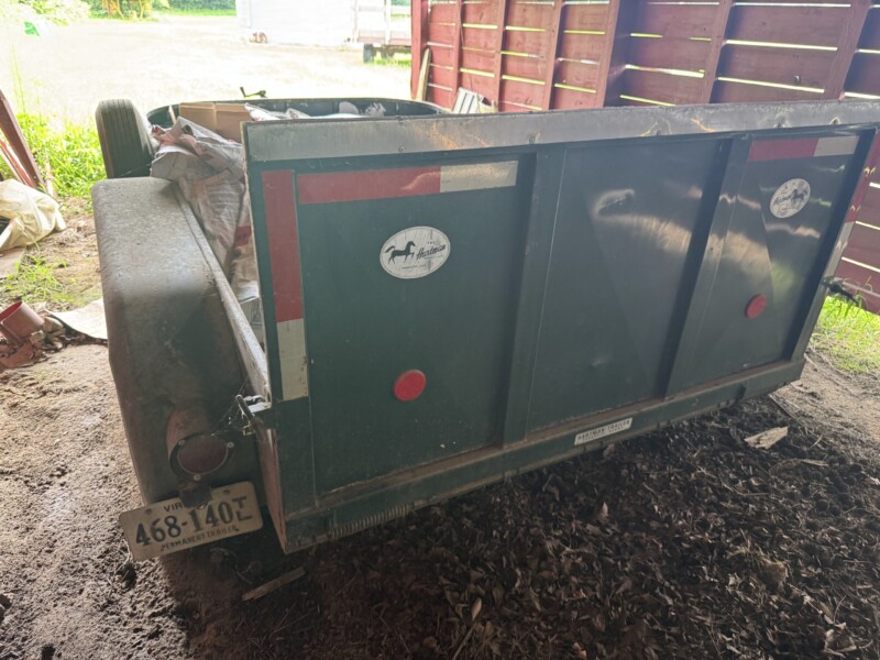 Lot 12: 10’ Dual axle flat bed tractor with ramp