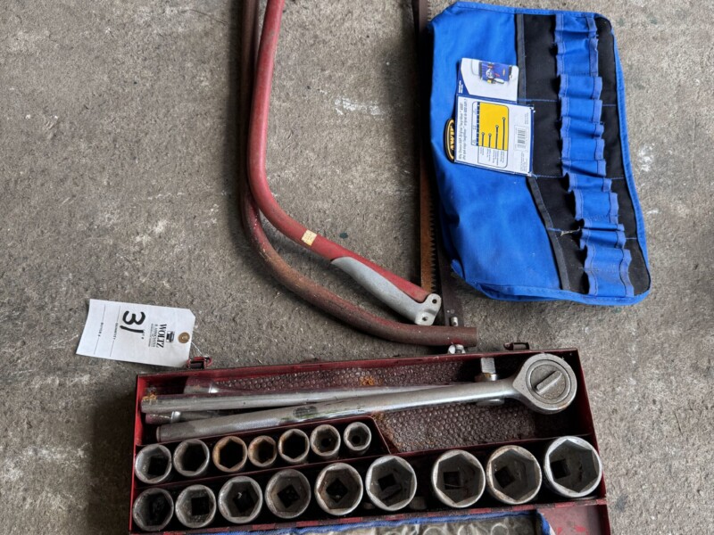 Lot 31: Big socket set, wrenches, (2) saws, bucket tool holder