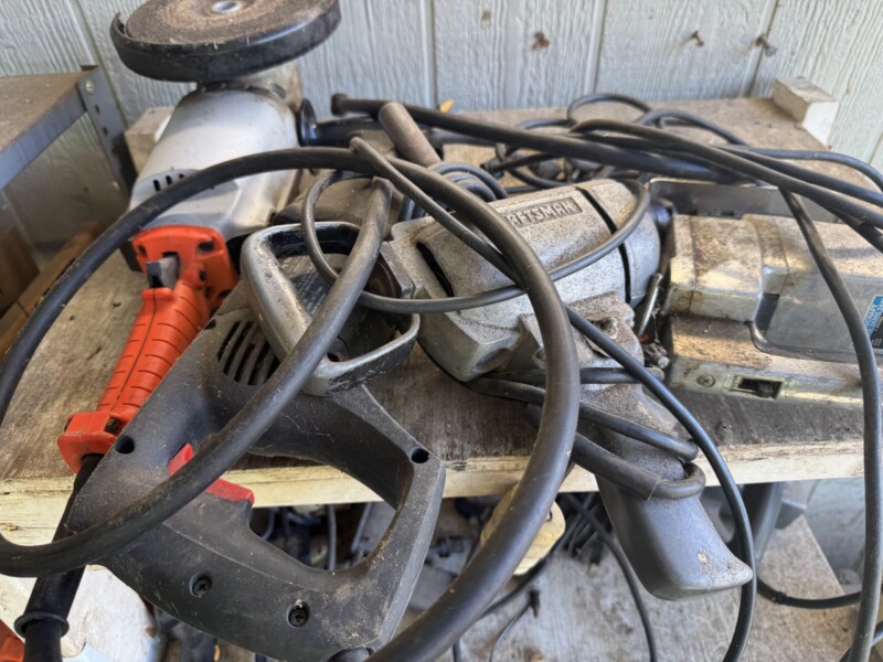 Lot 42: White wood shelf, contents. All tools work; I plugged them all in.