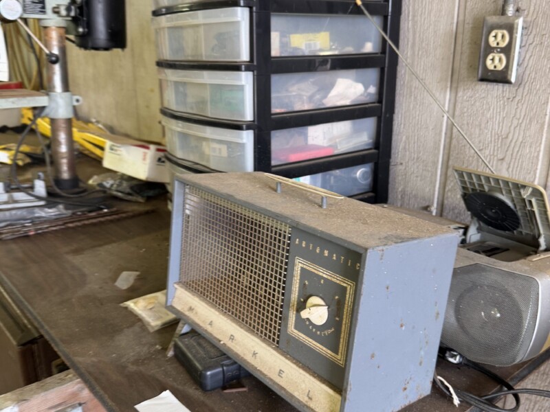Lot 38: Drill press, table and the remaining contents of the table, dorm room refrigerator